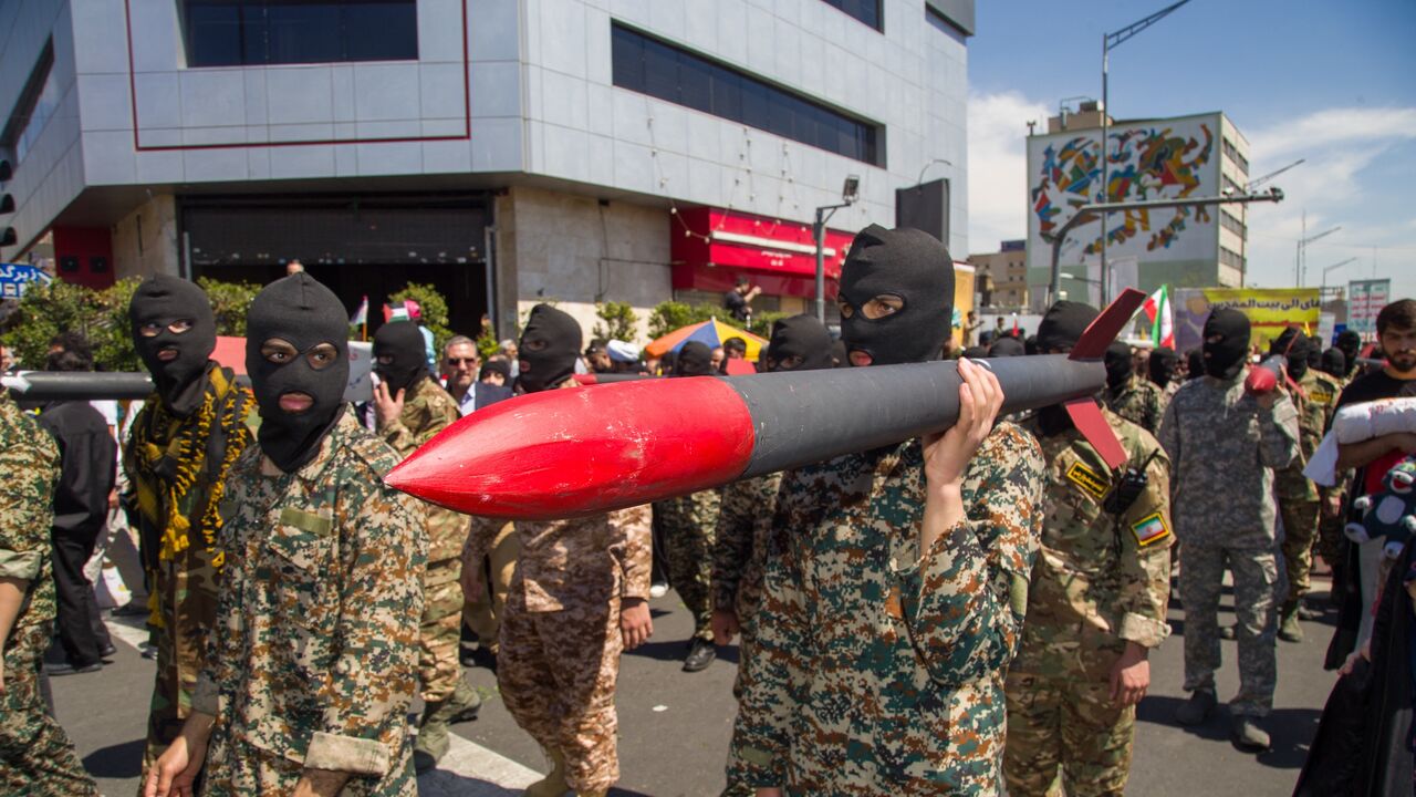 Iranians attend the funeral procession for seven Islamic Revolutionary Guard Corps members killed in a strike in Syria, which Iran blamed on Israel, in Tehran on April 5, 2024. 